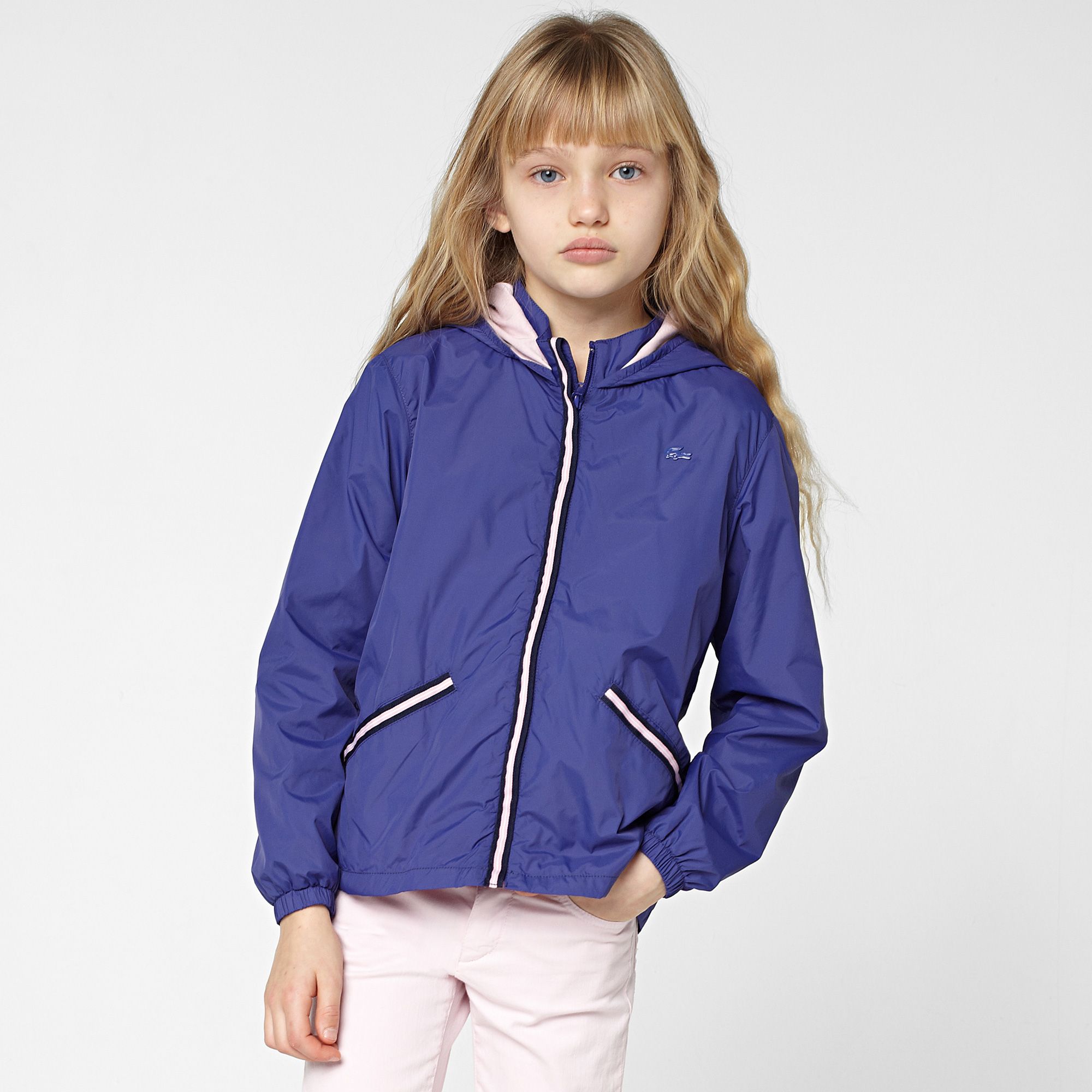 Lacoste Windbreaker with a folding hood gender.gir